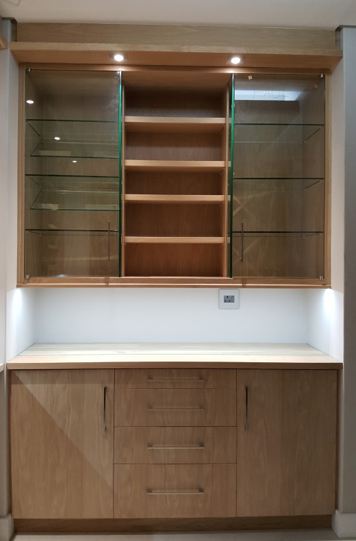 Top section of wine cellar unit to display wine glasses on right and cigar storage on left